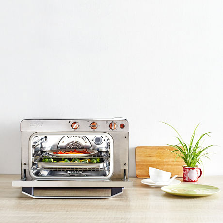 Review This Stylish Countertop Oven Can Steam And Bake Her