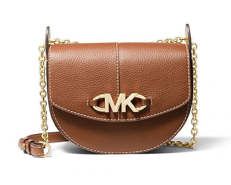 10 classic handbags with initial logo clasps we're eyeing now 