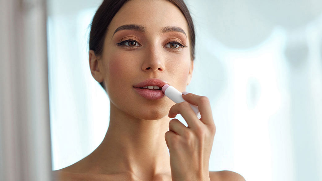 tinted lip balm travel makeup essentials